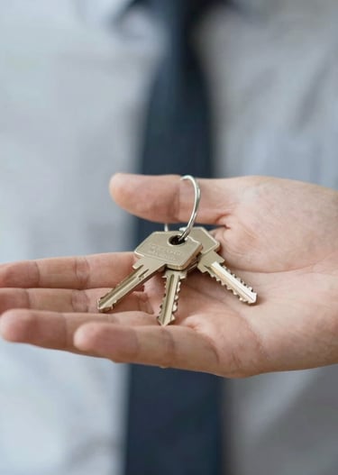 Close-up of keys being handed over, symbolizing a quick property sale.