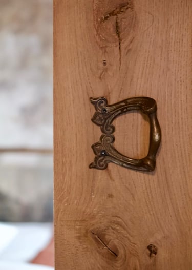 a door handle on a wooden door, interior design, French country home, normandy, antique, France