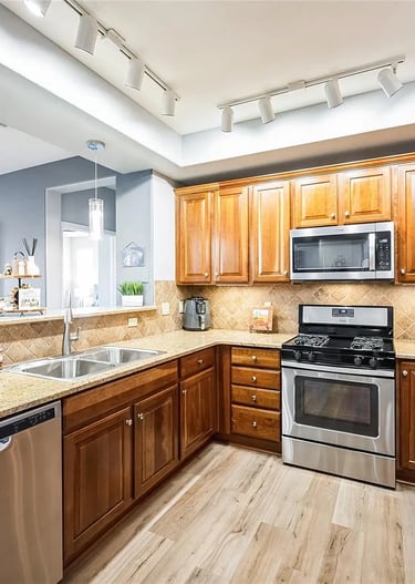 SparkEaseCleaning cleaned kitchen with stainless steel appliances in a Denver home
