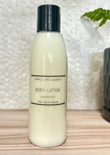a bottle of body lotion sitting on a table