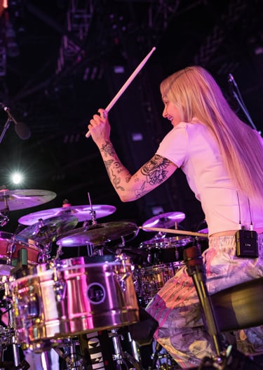 Professional touring drummer Lina Anderberg during arena soundcheck