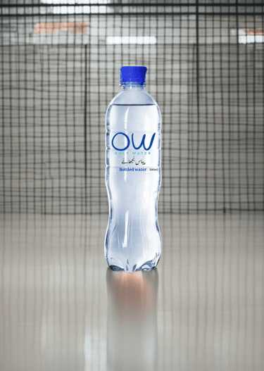 a bottle of water sitting on a table