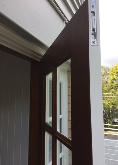 Ashgrove residence timber door and window staining by PJCPainters