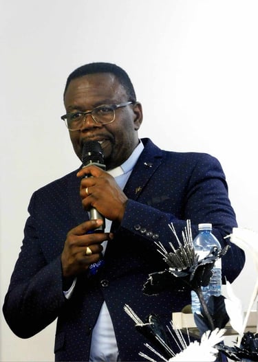 This is a picture of the senior pastor of Maranatha Evangeical Christian Church, Pastor Camille Masu