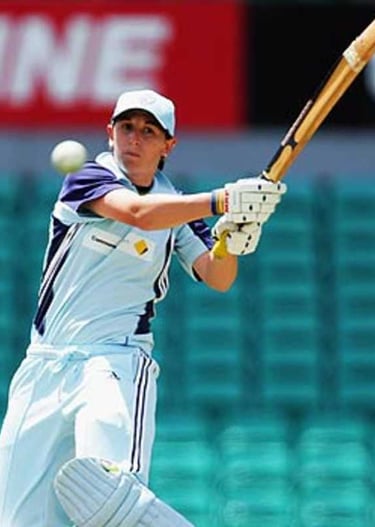 Michelle Goszko playing a pull shot.