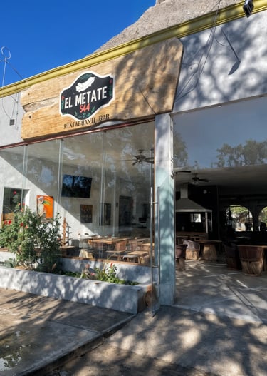 a restaurant with a sign that says el me matafeo