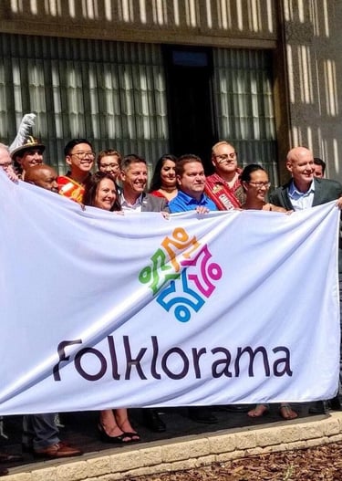 a group of people standing in front of a banner