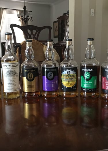 collection of Springbank whisky bottles