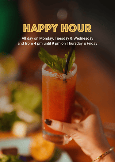 refreshing cocktail with mint garnish, featuring a blurred background of food and a Happy Hour sign