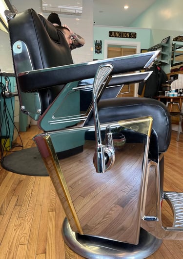 reupholstered vintage Takara Belmont barber chair side view