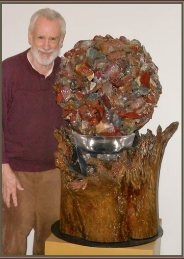 Jonny Haydn with his sculpture, "King Spheraf the Red"