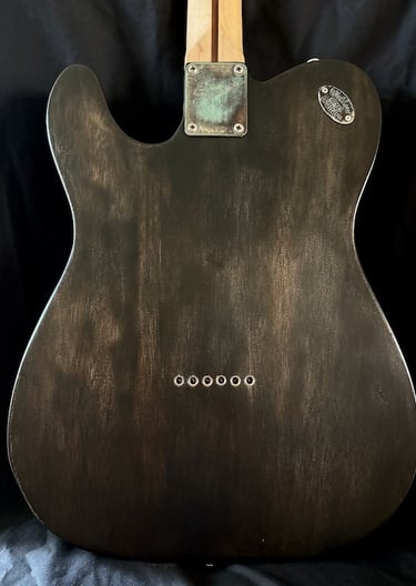 Sobek's Tele is a custom Telecaster guitar using dark industrial aesthetics back view