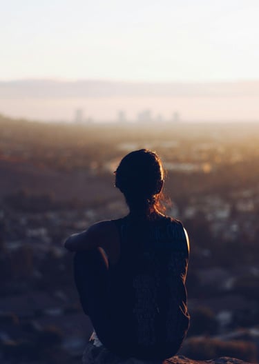 Girl looking at the ruin at dusk. 