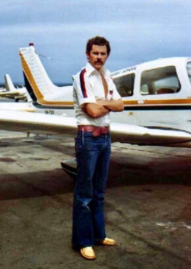 Private pilot Peter Pickering with a Piper Cherokee in the 70's