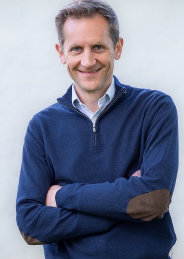 Marcus Norton with arms folded