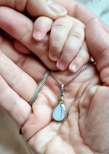 moedermelk ketting met haarlok
