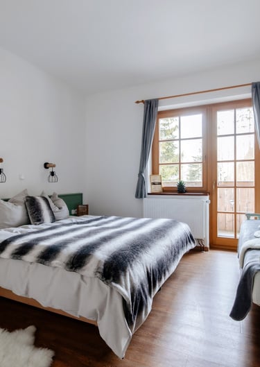a bed with a blanket on top of it