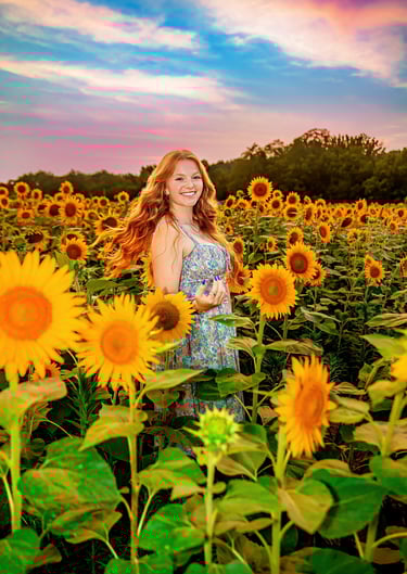 Senior Picture in a sunflower field by a professional senior picture photographer in Central PA