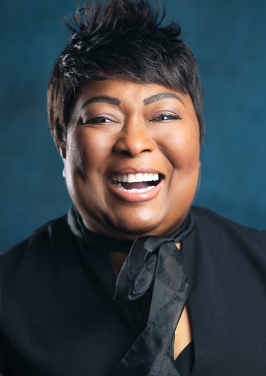 a woman with a black tie and a black tie