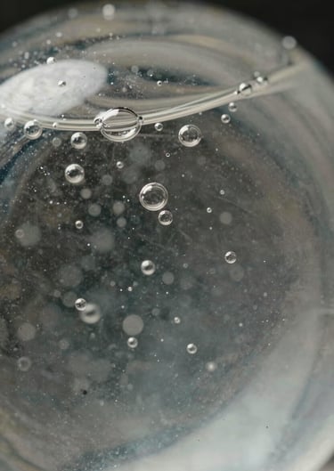 Close-up of clear resin with tiny, pristine air bubbles trapped purposefully to catch light, embodying modern sophistication.