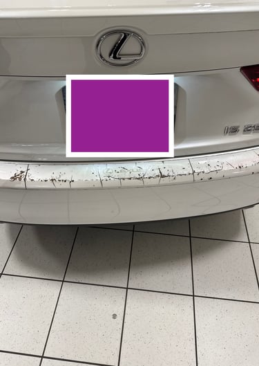 White Lexus IS bumper with damaged Paint Protection Film