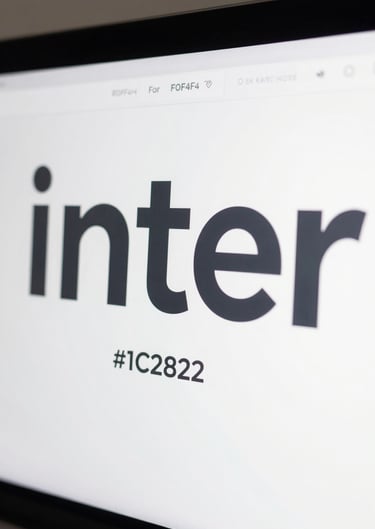 A close-up of a high-resolution display showing a typography-focused webpage. The font is Inter, appearing crisp and professional. The background is #F0F4F4 with text in #1C2826.