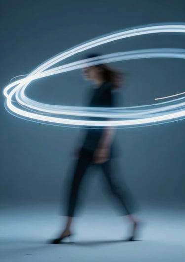 Dynamic movement of light trails in a studio, artistic long exposure effect, palette of #3D5A80 and #98C1D9.