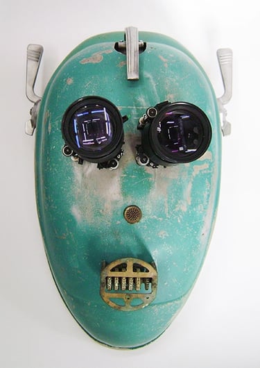Assemblage robot head named Eyeborg built by sculptor Tal Avitzur.