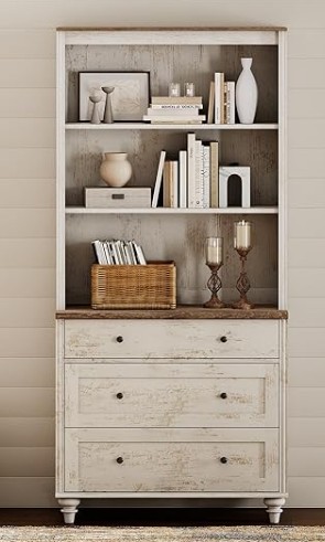 Distressed white rustic hutch cabinet and bookshelf filled with books and farmhouse decor.