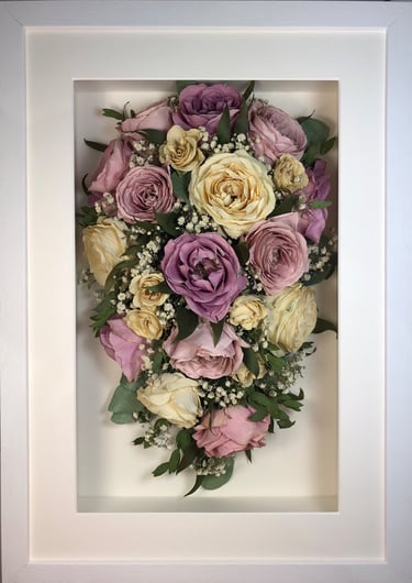 purple and ivory trailing view preserved wedding bouquet in a frame