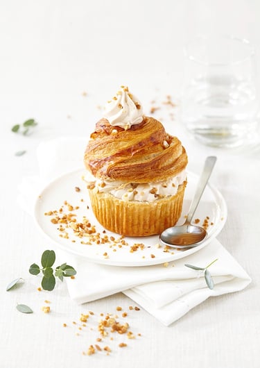 a dessert with a cup of coffee and a cup of coffee