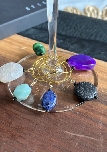 assorted gemstone wine charms