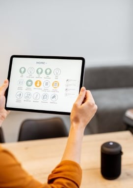 home automation, woman holding a tablet