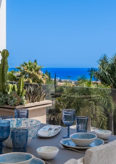 Rooftop dining area with sea views at Villa Serenity