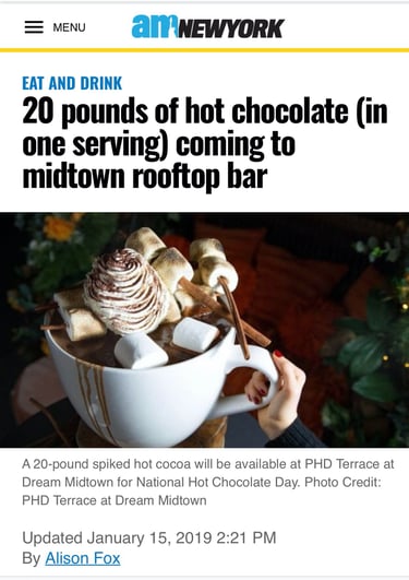 a person holding a cup of coffee and a cup of coffee