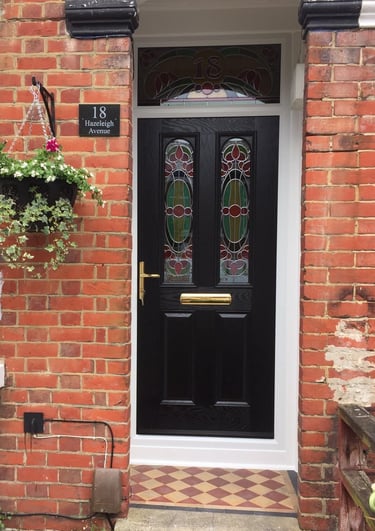 new black front door with bespoke glass which was fitted in Woolston, Southampton by Buildmydoor