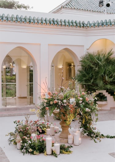 Outdoor dining area at Villa El Rincon in Marbella, with beautiful decorations for a Mediterranean destination wedding.