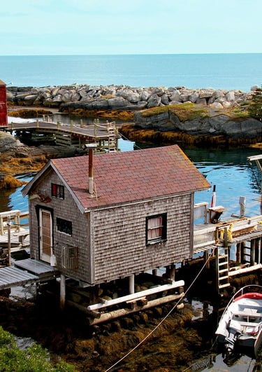 small cabin with boat near dock in LUNENBURG Nova Scotia