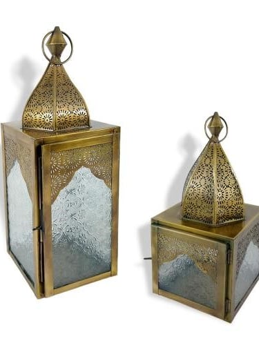 a pair of brass - plated lanterns with a glass door