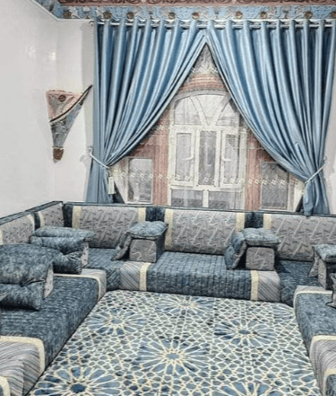 a living room with a couch and a couch