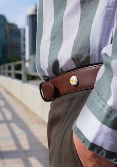 zoom in of man with unique belt | olio my shop