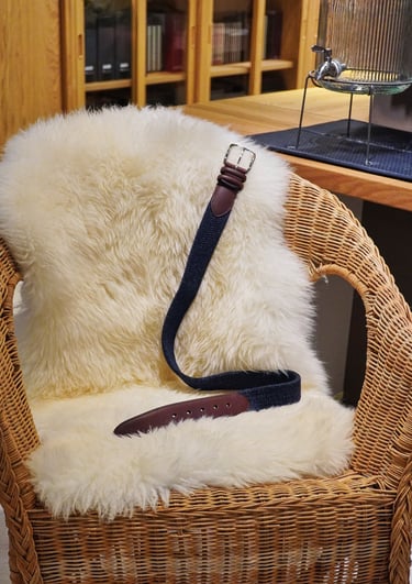 navy belt on a fur rug |  olio my shop
