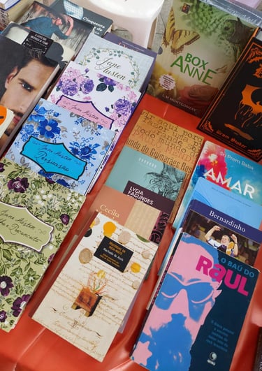 a table with a bunch of books and books