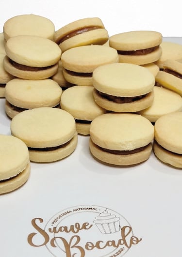 a bunch of cookies and a cupcake on a table