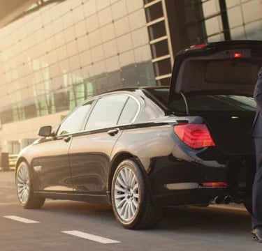Private Driver with black car