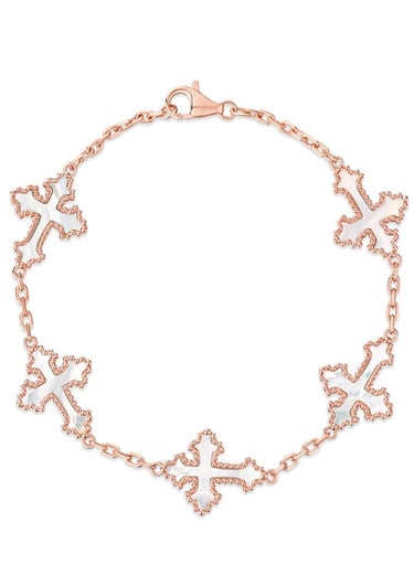 a bracelet bracelet with a cross - cut out of the middle
