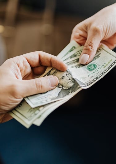 a person giving a loan of money to another person