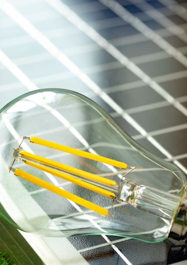 a light bulb bulb on a solar paneled solar powered light bulb