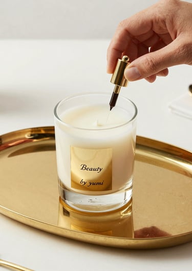 A beautifully arranged set of artisanal candles glowing softly on a marble surface.