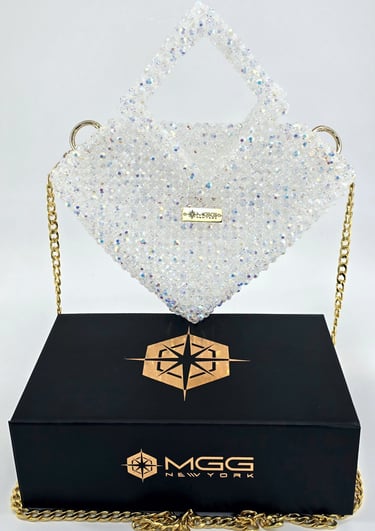 Diamond-shaped luxury handbag handcrafted with iridescent clear crystal beads, top handle and chain